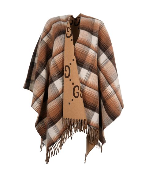 gucci reversible poncho.